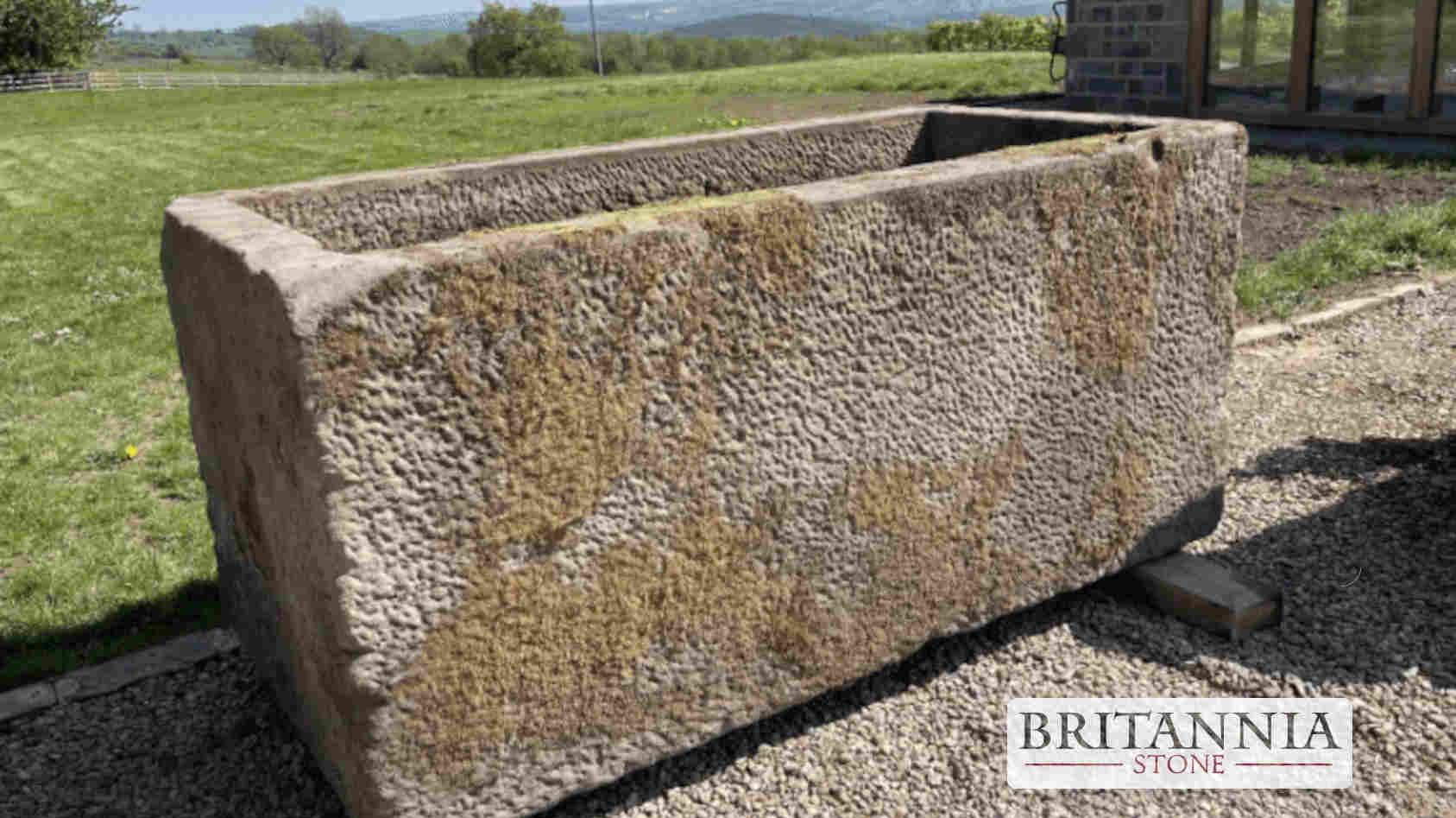 Timeless Appeal of Reclaimed Stone Trough Planters
