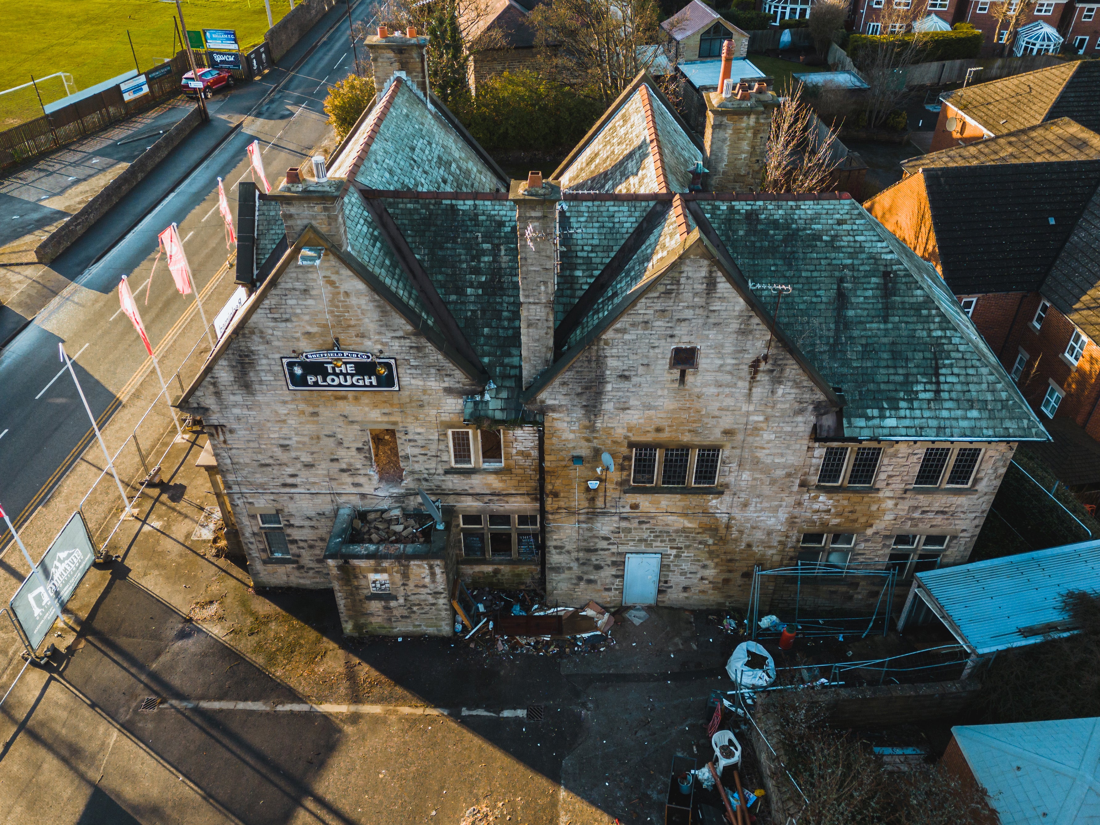 stone pub ready for demolition and reclamation team