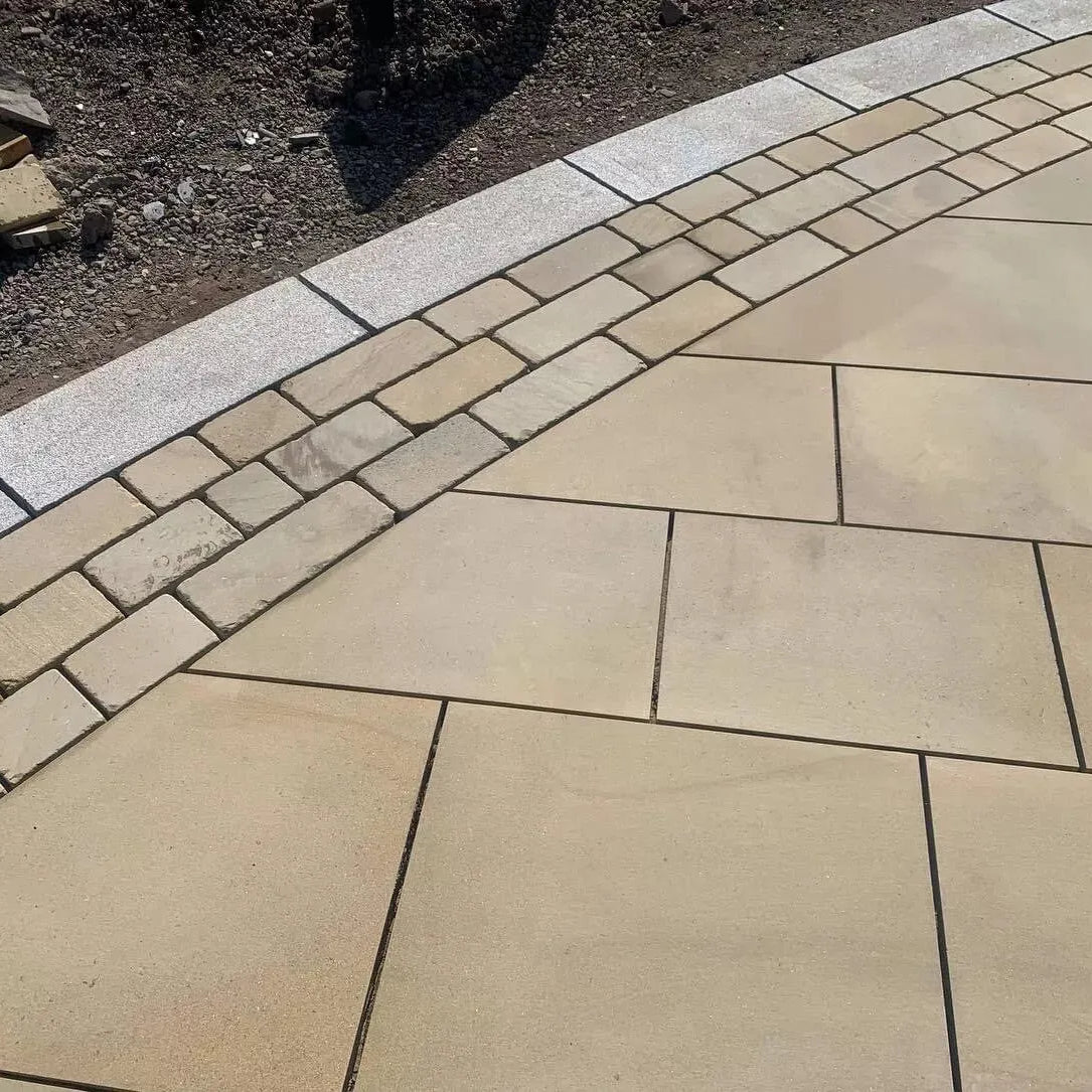 yorkstone Tumbled Stone setts block Paving drive path driveway.