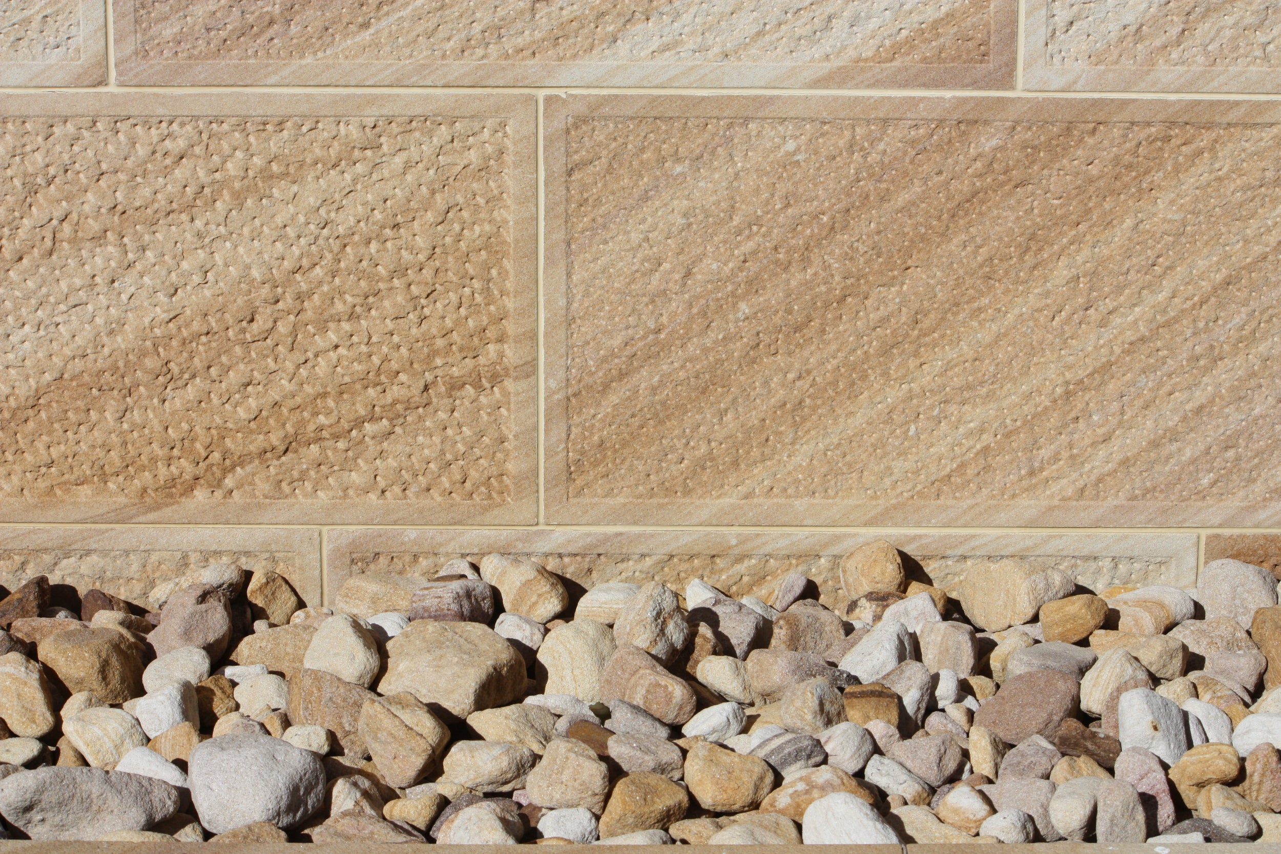 Sparrow pecked with margin natural sandstone building