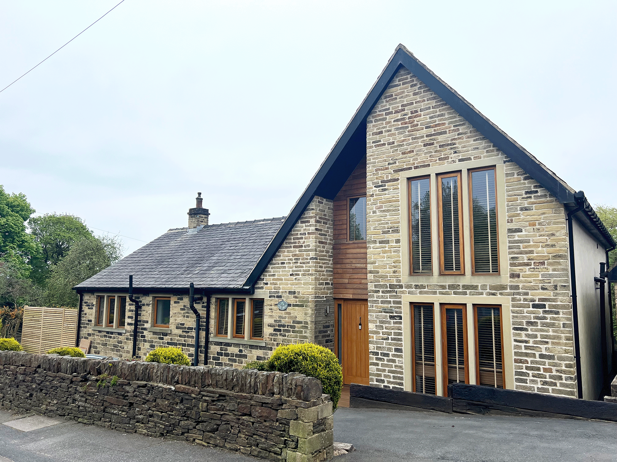 traditional family stone home built using reclaimed stone supplied by Britannia stone yard