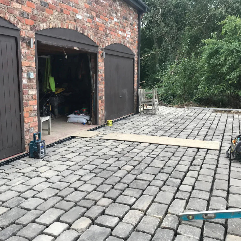 Reclaimed Grit Stone Cobbled Driveway by Britannia Stone, example of Large Grit Stones -  cobbled driveway