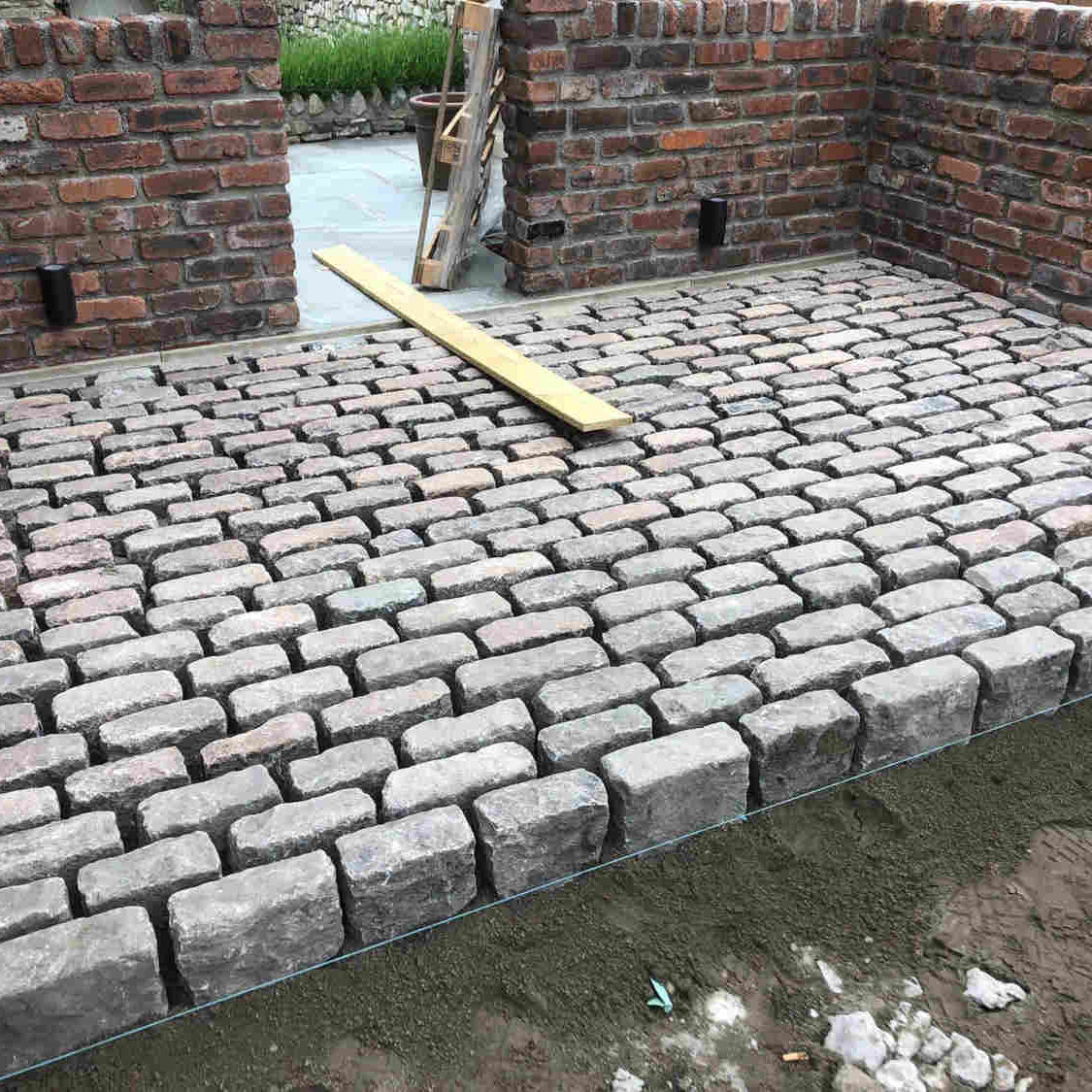 Reclaimed  cobble setts courtyard construction |  Britannia Stone