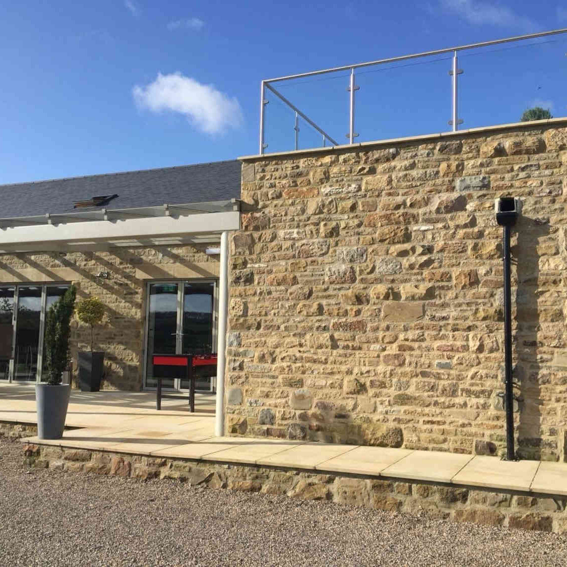 Stone building built from reclaimed Walling Stone in Bulk Bags   - Britannia Stone