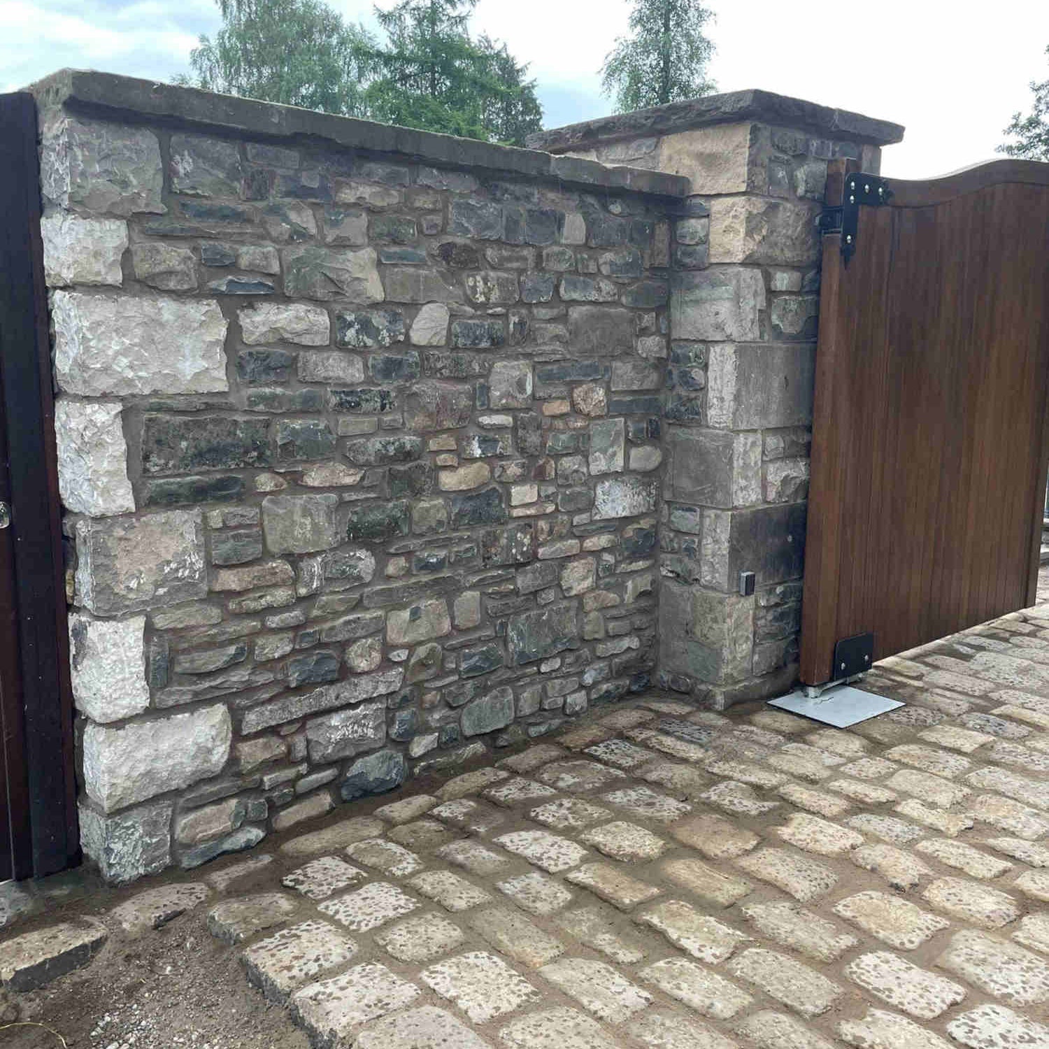 Stone entrance wall and stone pillars built from reclaimed Walling Stone in Bulk Bags  - Britannia Stone