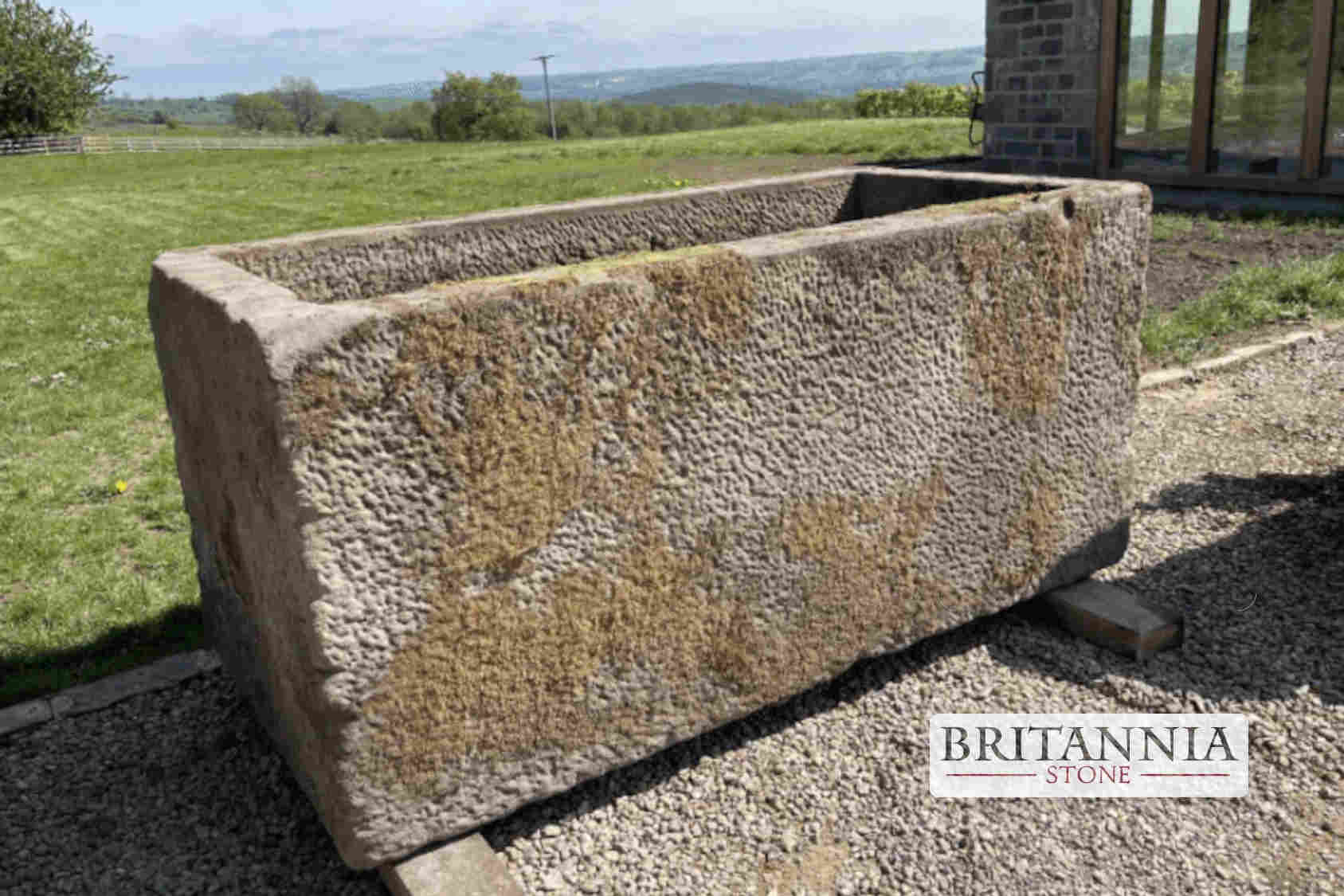 Timeless Appeal of Reclaimed Stone Trough Planters