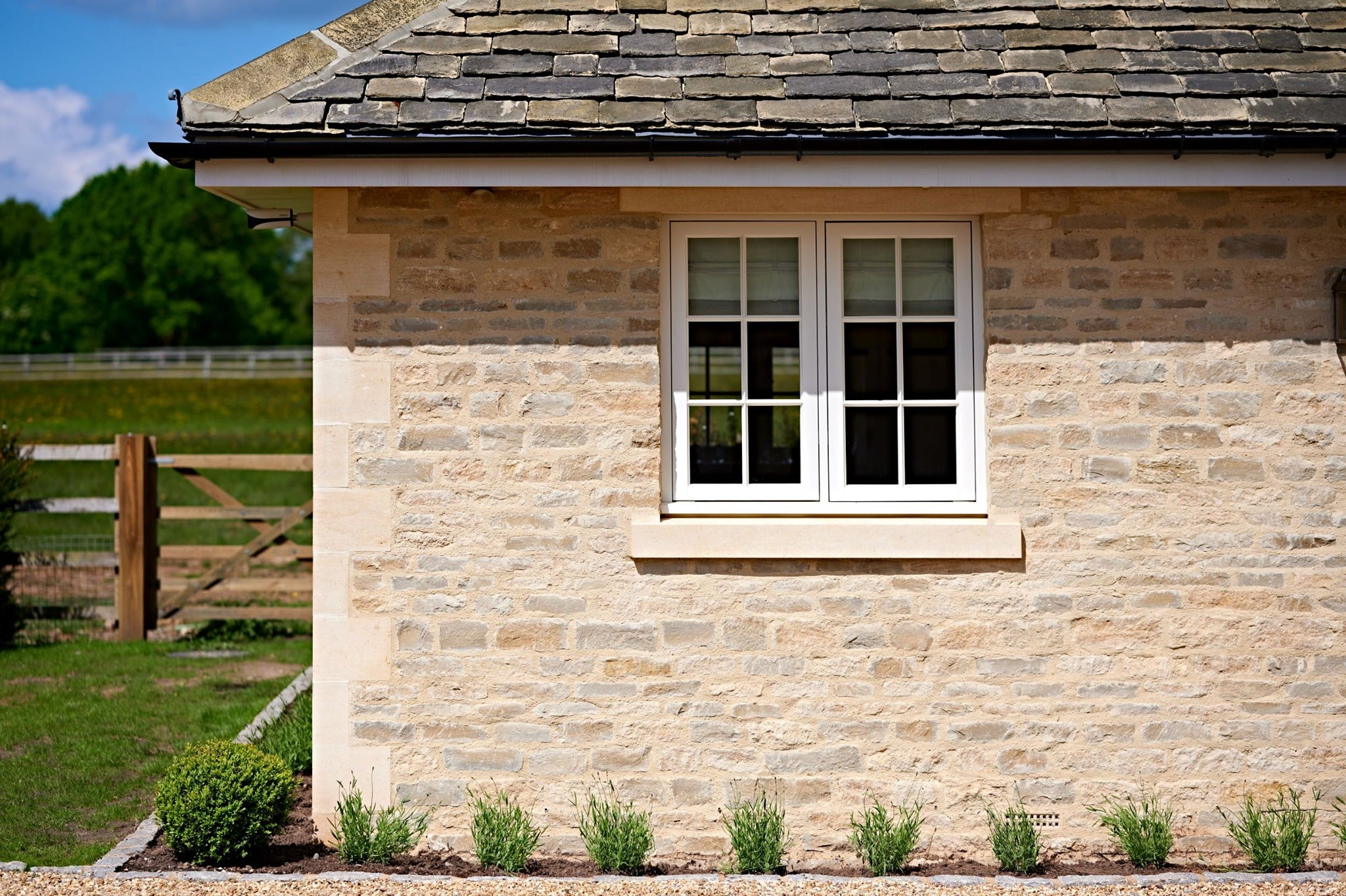 Natural stone limestone window lintel in New stone built extension | Britannia Stone