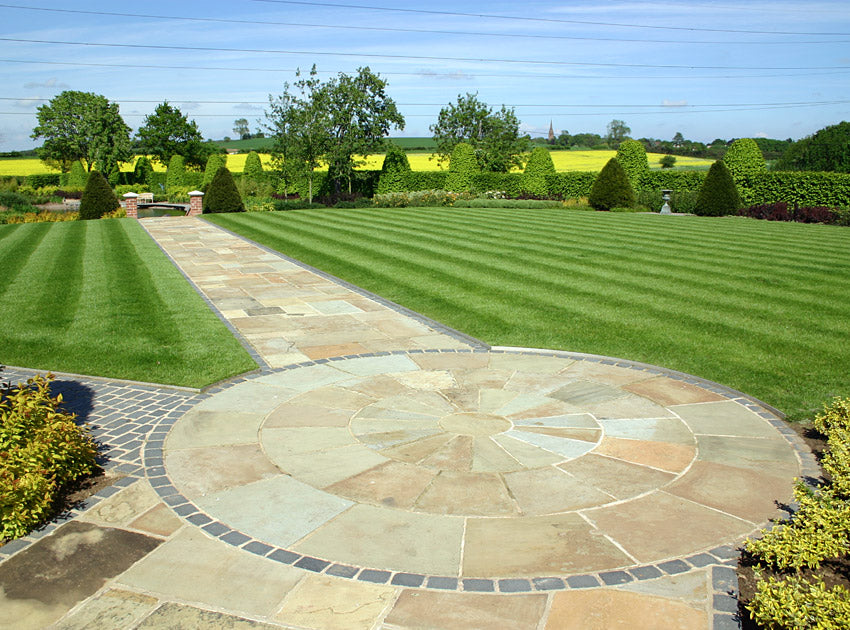 Natural Stone paving and cobble sett garden edging supplied by Britannia Stone
