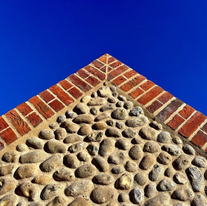 Flint stone walling and red brick