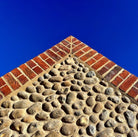 Flint stone walling and red brick