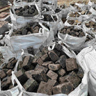 Reclaimed  mixed  granite cobble setts in bulk delivery bags |  Britannia Stone