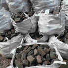 Reclaimed  mixed  granite cobble setts in bulk delivery bags |  Britannia Stone