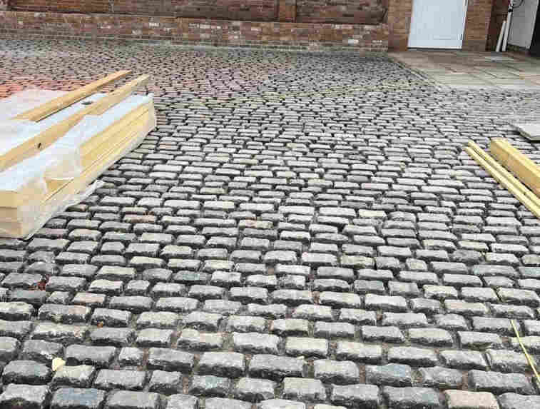 Reclaimed  cobble setts courtyard  construction |  Britannia Stone