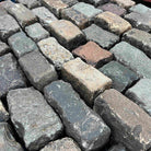 Reclaimed  mixed  granite cobble setts |  Britannia Stone