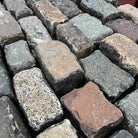 Reclaimed  mixed  granite cobble setts |  Britannia Stone