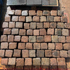 Reclaimed pink 4-x-4 cube granite-cobble setts Britannia Stone